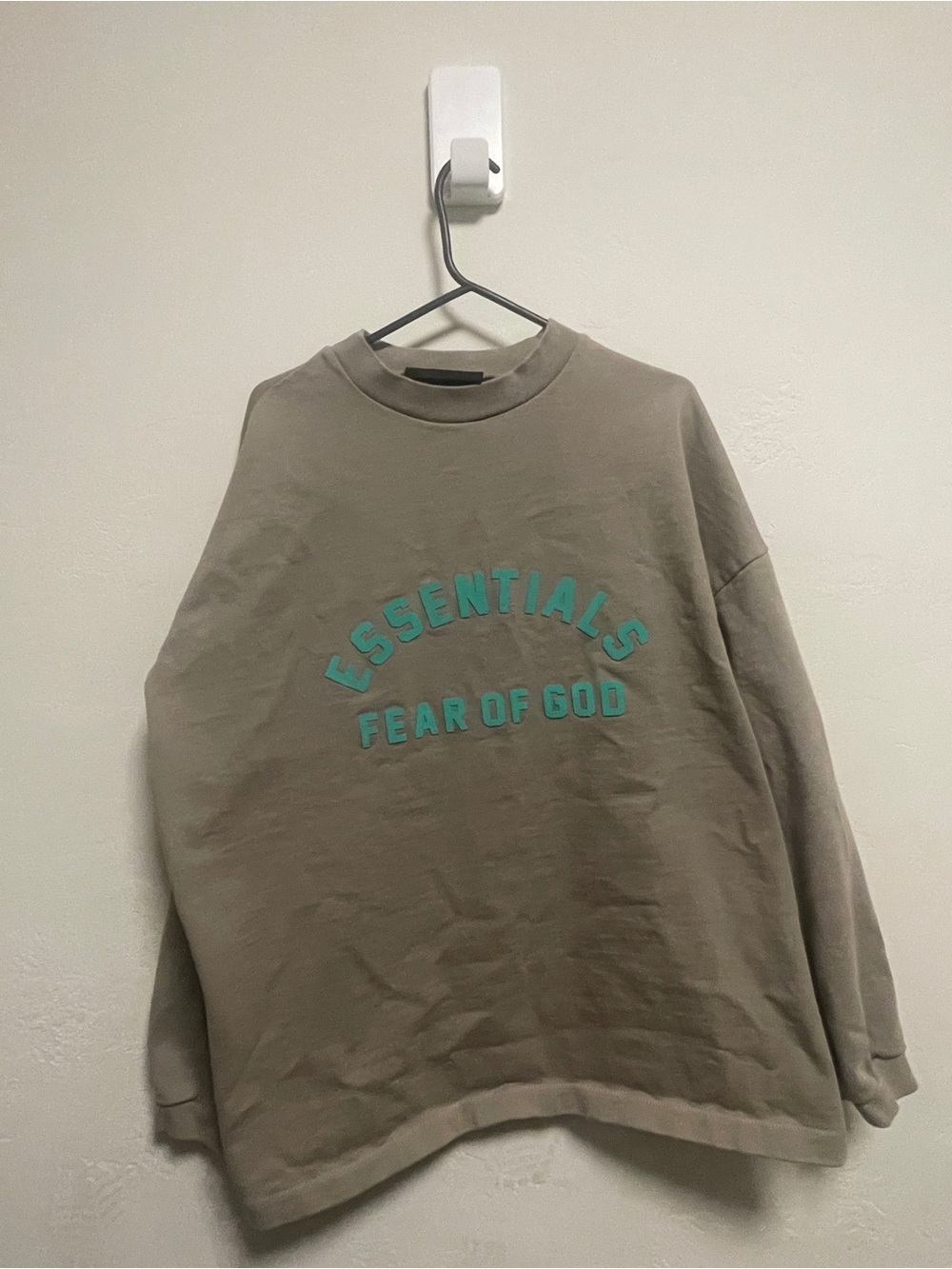 Essentials Crewneck Sweatshirt by Fear of God in Taupe with Teal Logo